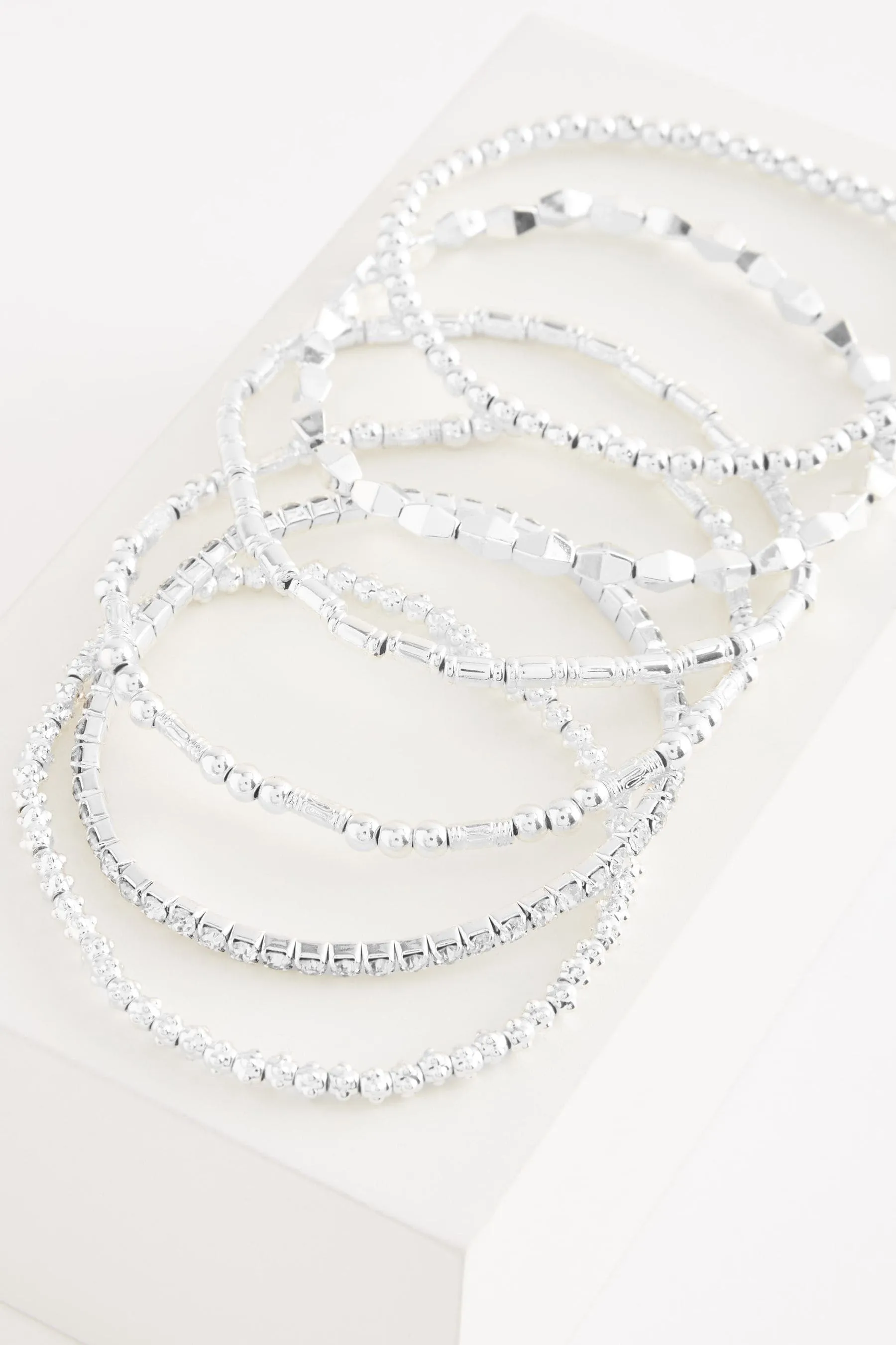 Confezione con bracciale elasticizzato luccicante
