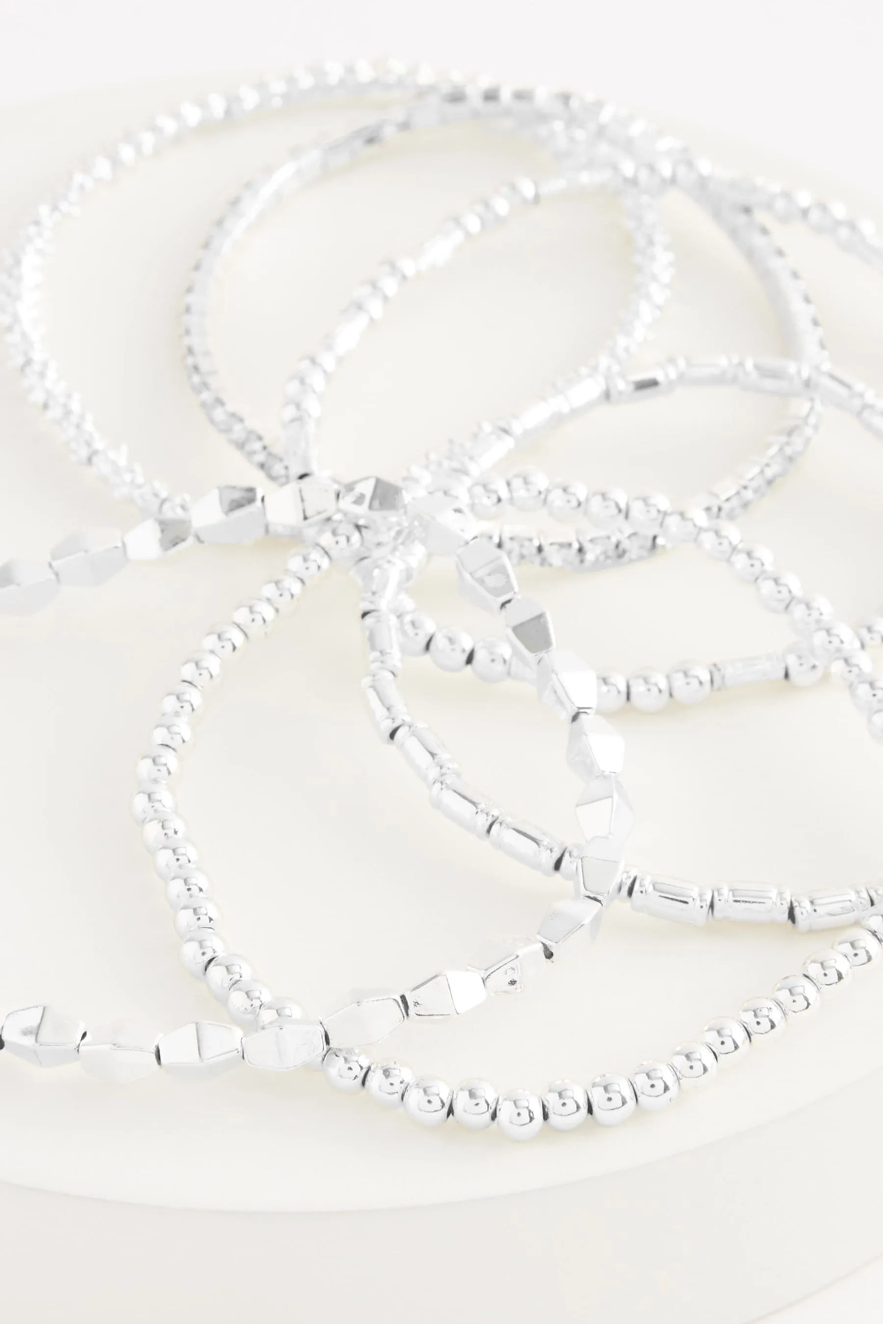 Confezione con bracciale elasticizzato luccicante