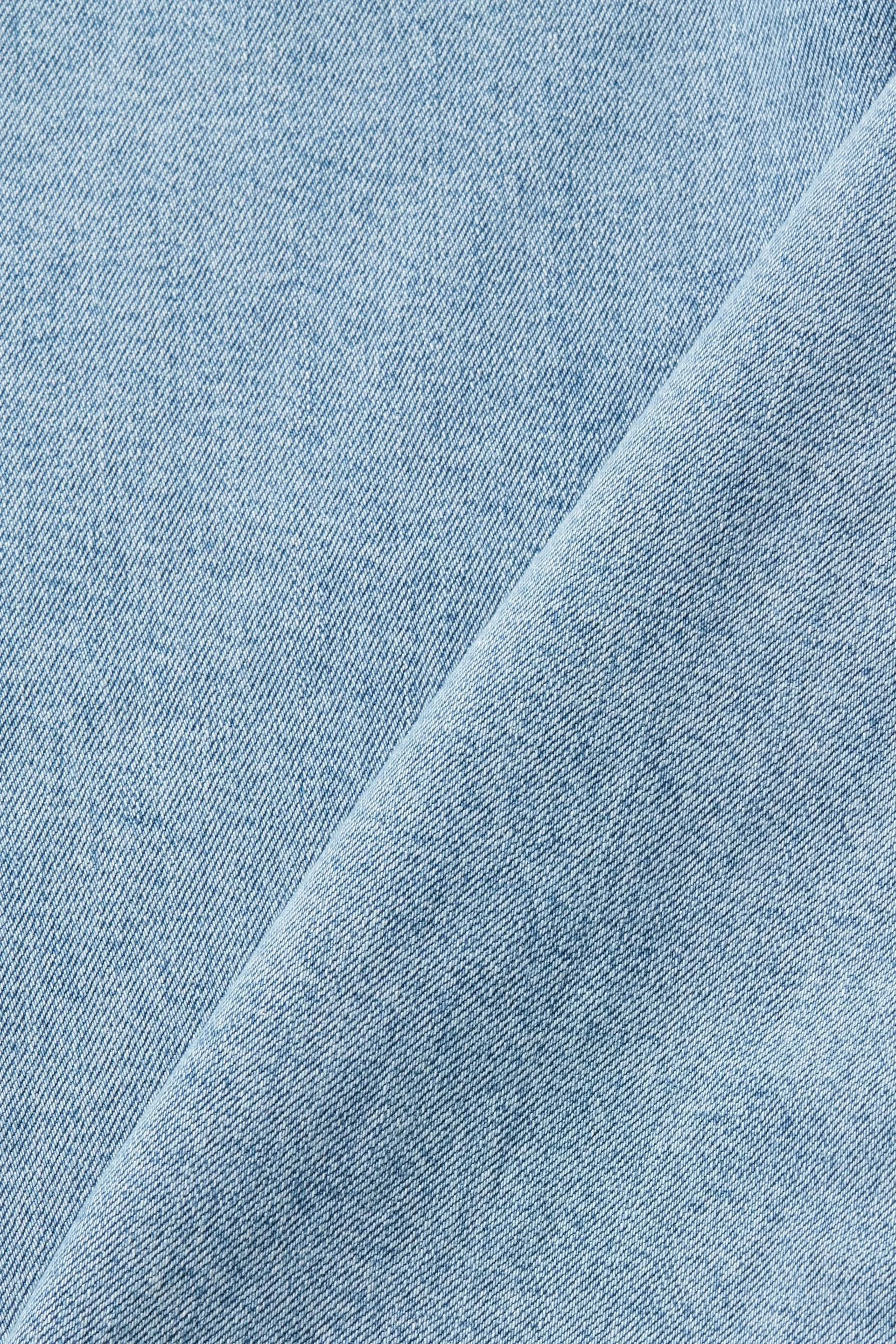 Jeans a zampa con vita alta